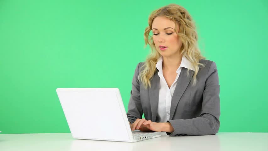 Businesswoman working on laptop computer