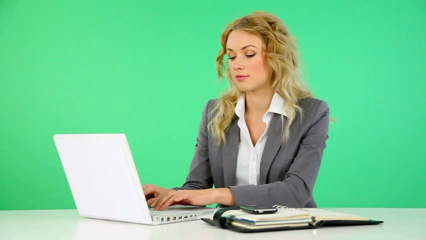 Businesswoman working on laptop computer