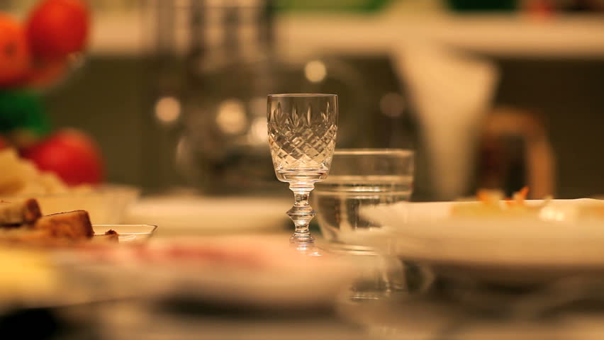 glass of alcohol on the table, drinks and snacks,   close-up