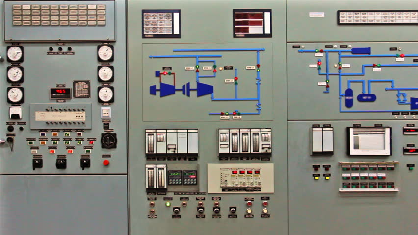 engineer comes to checking light indication on main control panel of compressor station