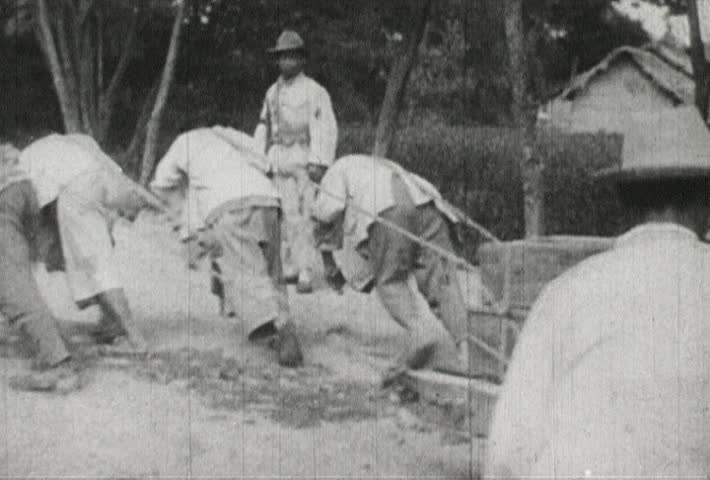 CHINA - CIRCA 1942-1944: World War II, Chinese Men Pulling A Cart