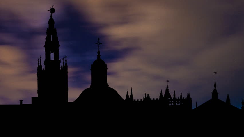 Seville Cathedral, or Catedral de Santa Maria de la Sede and Giralda Tower, former minaret converted to a bell tower for the Cathedral of Seville in Seville are located in Seville, Spain. 

