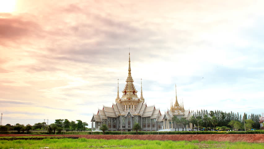 timelapse,clouds move or running over buddha thai temple