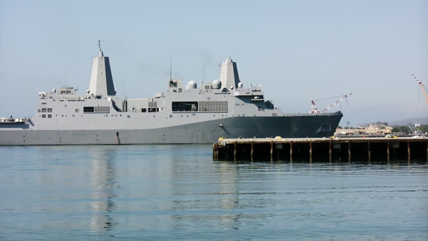 Navy Communications Ship Advancing (HD). Navy communications ship entering port for docking. All ID marks, numbers and legends have been cloned out.