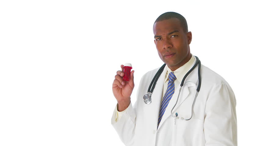 Medical doctor holding a prescription pill bottle