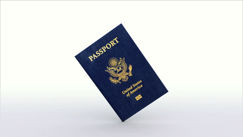 Passport of the USA citizen  spins around its axis and falls on the table (includes alpha matte)