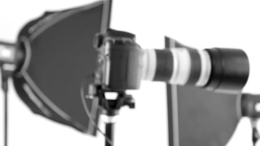 Rotating camera by operator in the studio - Focus on lens