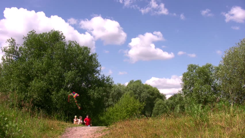 Family with boy with kite 