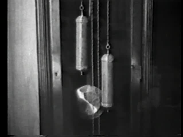 Pan up grandfather clock