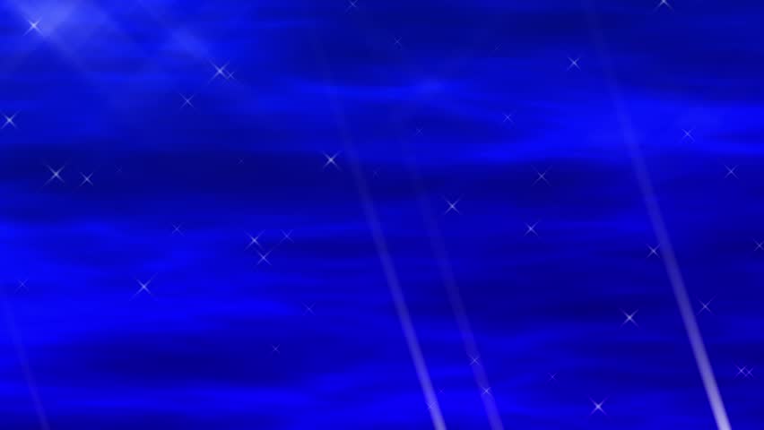 blue time lapse motion clouds with shining, penetrating shafts of light.