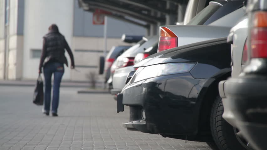  Car pulls in at parking lot