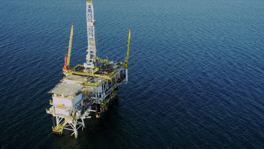 Aerial view of oil producing platform deep ocean, USA