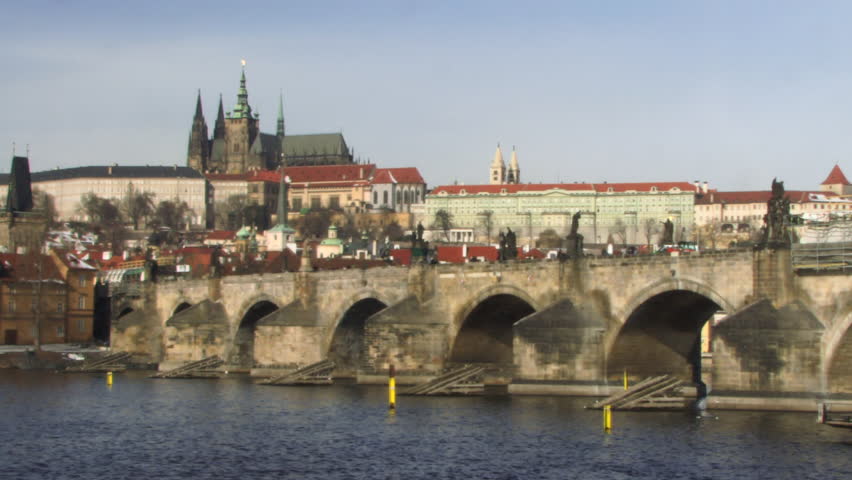 WIDE SHOT, PAN Charles Bridge, Vitava river and St Vitus Cathedral, Prague, Czech Republic, 