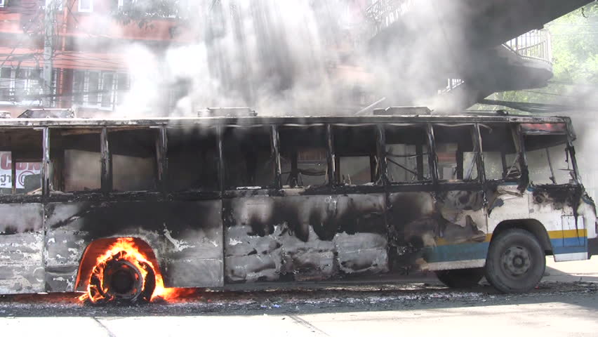 Protesters set buses on fire in violent confrontations with government forces April 5, 2009 in Bangkok, Thailand