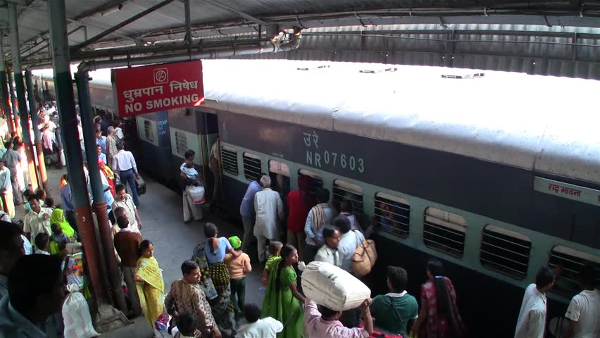 DELHI - NOV 13: People waiting for their trains in the Delhi Junction Railway Station on November 13, 2011 in Delhi, India. Delhi Junction is the oldest railway station of Delhi city.