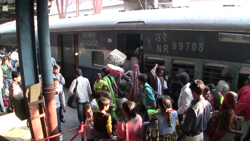 DELHI - NOV 13: People waiting for their trains in the Delhi Junction Railway Station on November 13, 2011 in Delhi, India. Delhi Junction is the oldest railway station of Delhi city.