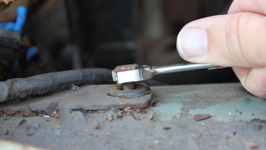 Old Automotive Bolt Loosened With A Wrench 