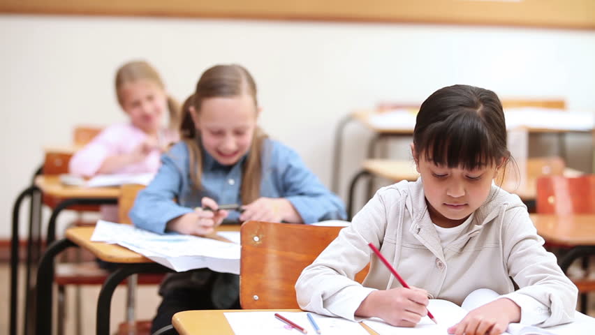 Pupils working in the classroom