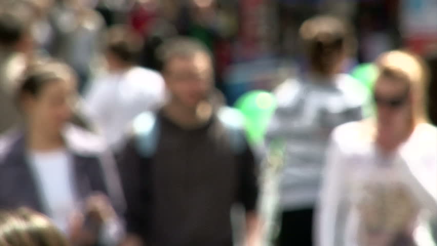 People walking down the street, unrecognizable