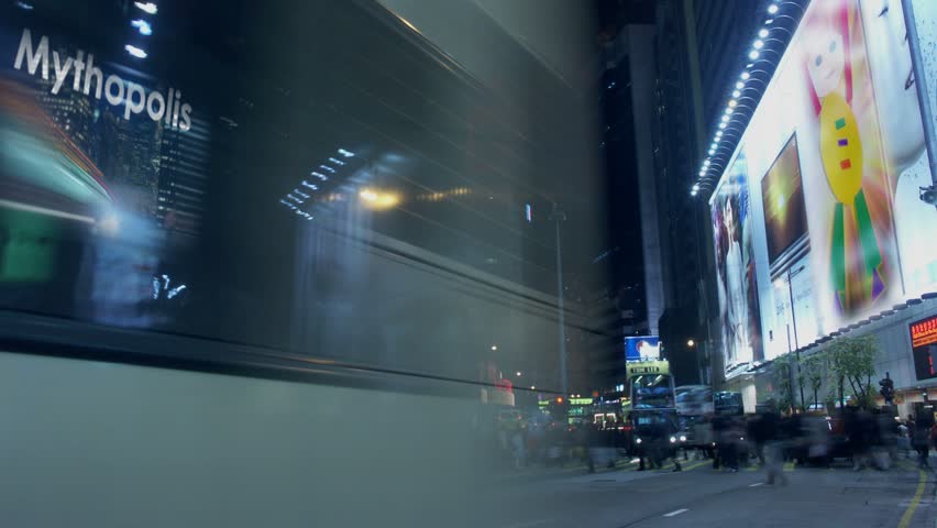 Hong Kong - Circa 2010: Hong Kong traffic in 2010. Timelapse of traffic with double decker buses, Kowloon, Hong Kong.