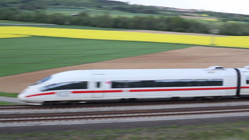 WALLAU, GERMANY â MAY 4: A passing german highspeed train (ICE) on the Frankfurt-Cologne line on May 4, 2012 near Wallau, Germany. The maximum speed of these highspeed trains is around 320km/h.