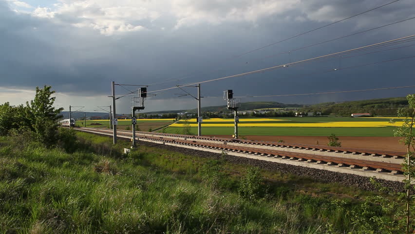 WALLAU, GERMANY â MAY 4: A passing german highspeed train (ICE) on the Frankfurt-Cologne line on May 4, 2012 near Wallau, Germany. The maximum speed of these highspeed trains is around 320km/h.