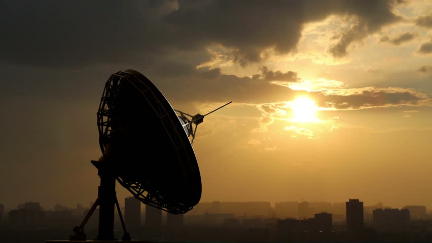 rotating radio telescope at sunset, 3d animation against sky background