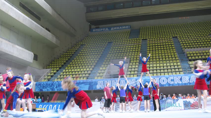 MOSCOW - MAR 24: (Timelapse View) Tornado team participates in Annual competitions of Championship of Moscow on cheerleading in Dynamo sports palace, on March 24, 2012 in Moscow, Russia