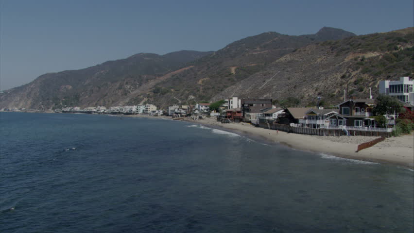 aerial flying shot of California coastline