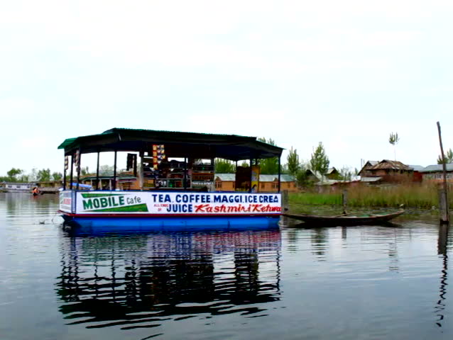 SRINAGAR, INDIA - APRIL 14: Floating lake coffee house sells fast food, tea, coffee and Kashmiri Kawa on April 14, 2012 in Dal Lake, Srinagar, Jammu and Kashmir, India. 