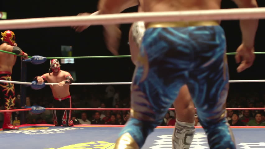 MEXICO CITY - DECEMBER 19: Ringside view of a lucha libre, famous mexican wrestling competition at Arena Mexico on DECEMBER 19, 2011 in Mexico City, Mexico. 