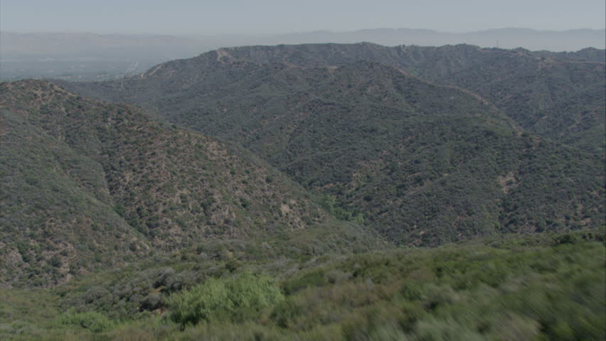 Fly over of rugged mountain terrain in Southern California