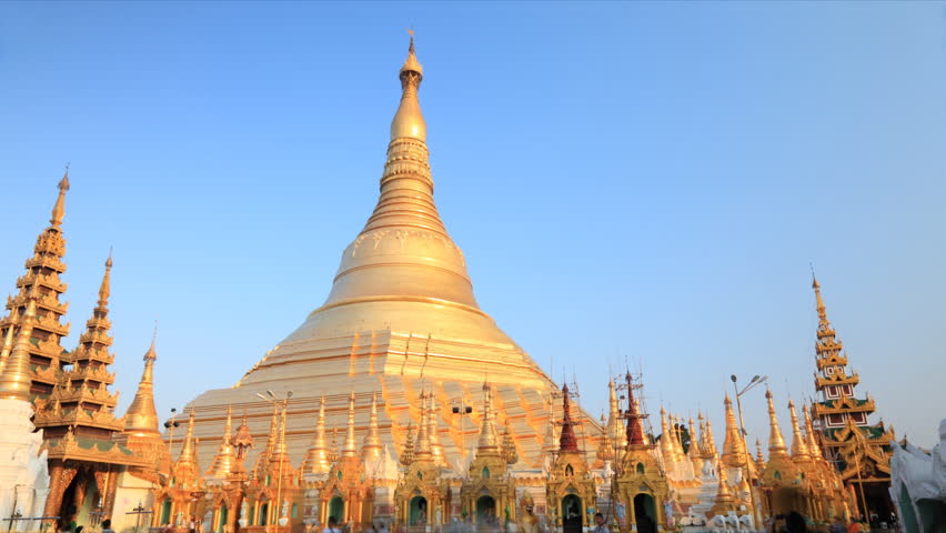 YANGON, MYANMAR- APRIL 15 : People visit the Shwedagon Pagoda on April 15, 2012.  Shwedagon Pagoda is the most sacred Buddhist pagoda for the Burmese. 