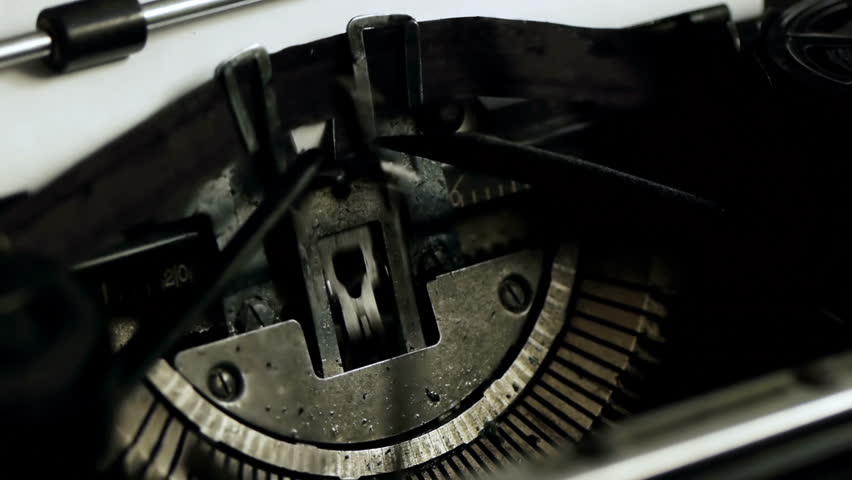 Once Upon A Time Typed Side (HD). Once Upon A Time being typed on Vintage 1940s typewriter seen from an angle with shallow depth of field. Ambient audio Included. 