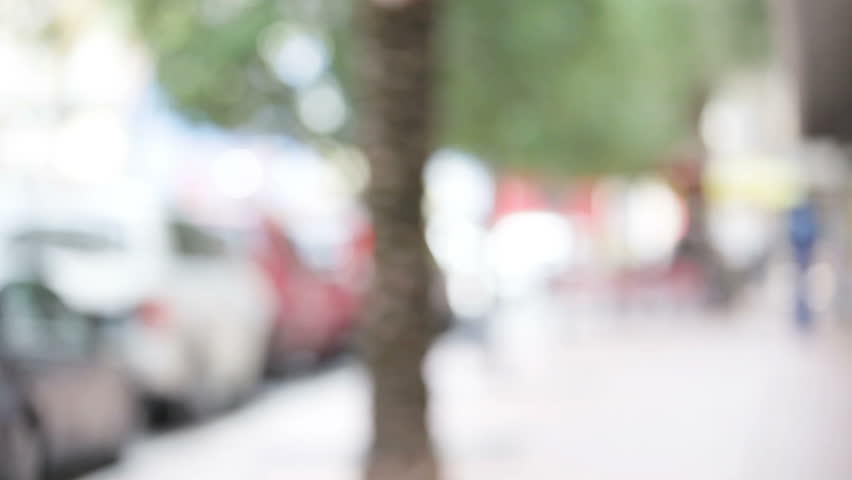 Man on the phone gets distracted by his friends