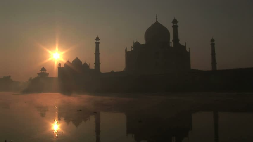 reflection sunrise shot of Taj Mahal