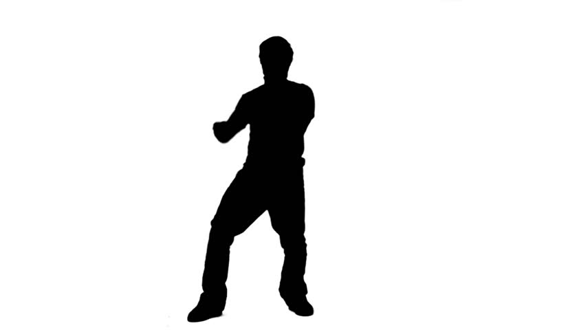 A silhouette of a man singing into a microphone against a white background