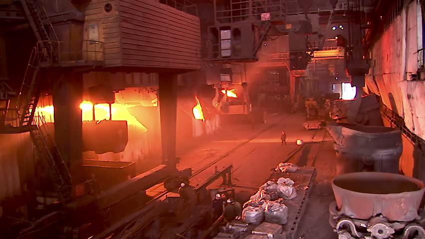 Iron and Steel Works. Converter plant. Loading scrap metal into a melting furnace.