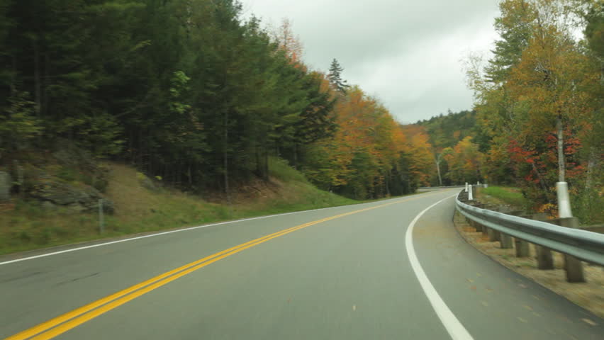 Timelapse driving POV on the Kancamagus (Kanc) Highway during Autumn in the White Mountains of New Hampshire.