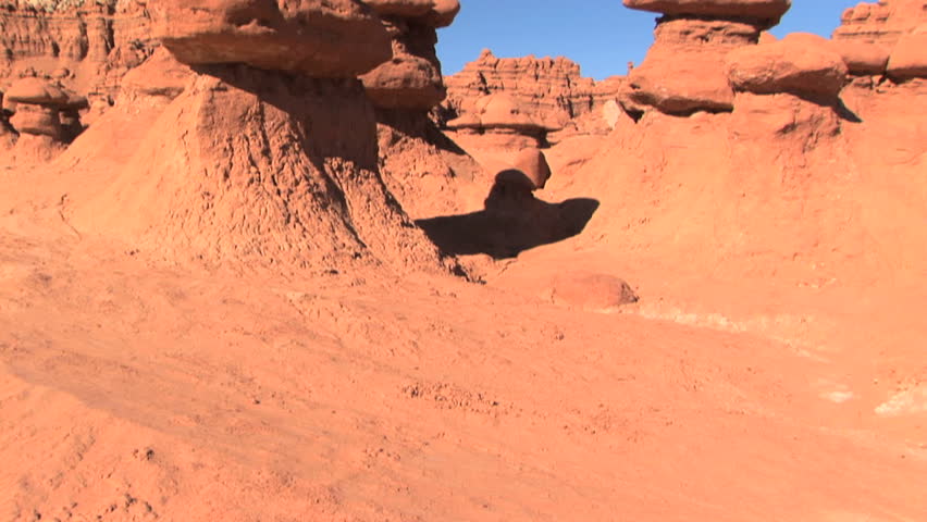 Unique eroded rock formation in Goblin Valley State Park, Utah tilt up