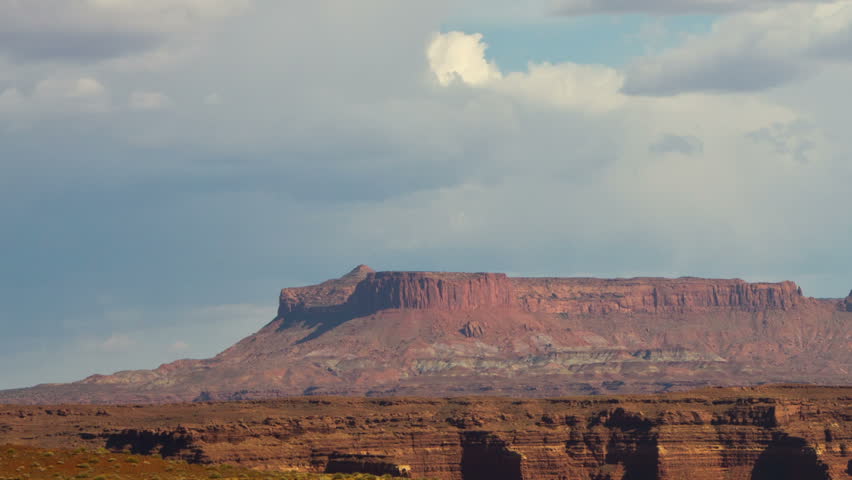 A timelapse of clouds over a stark southwest American landscape. Near Glen Canyon, Utah.