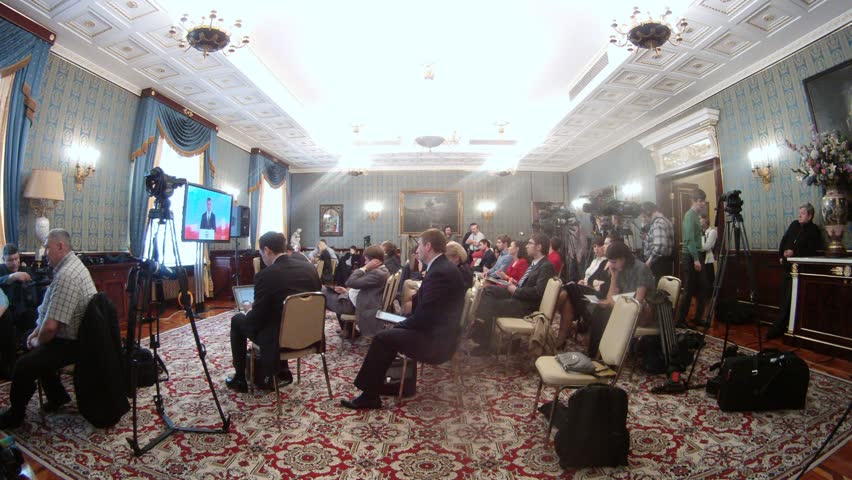 MOSCOW - APR 24: (Timelapse View) Journalists sit in hall during meeting of State Council in Georgievsk hall of Big Kremlin palace, on April 24, 2012 in Moscow, Russia 

