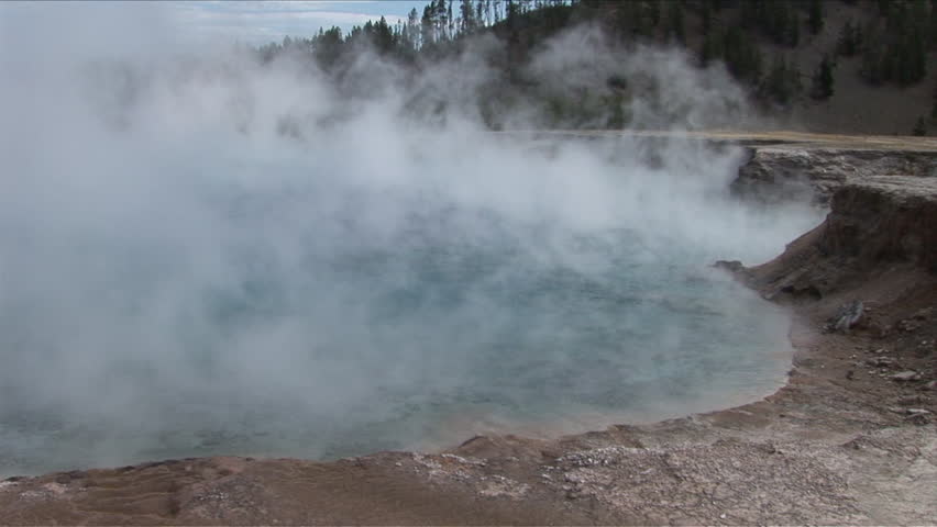 View of geyser steam in Yellowstone National Park Wyoming United States
