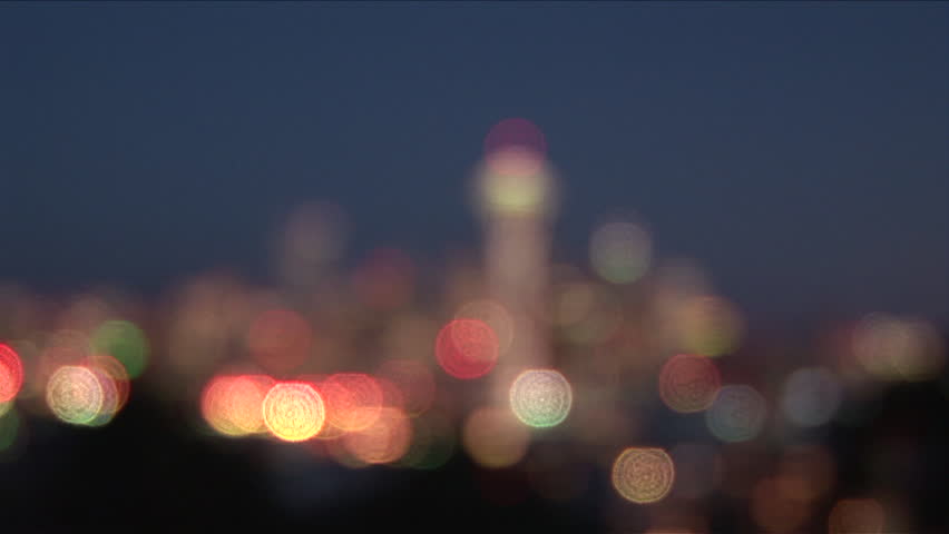 Wide shot with pull focus of Seattle city at night in United States