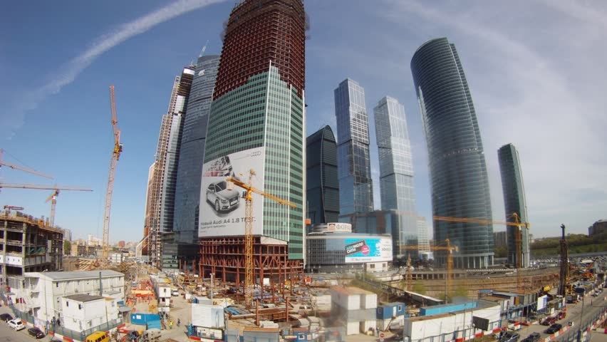 MOSCOW - MAY 2: (Timelapse View) Cars go near building Moscow City business center in afternoon, on May 2, 2012 in Moscow, Russia