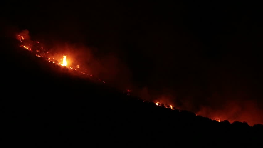 FOUNTAIN GREEN, UTAH - JUN 23: The Sanpete forest fire burns out of control during the night in Wood Hollow Canyon on June 23, 2012 in Fountain Green, Utah. The fire had burned over 6,000 acres and caused more than 500 homes to be evacuated as of June 25.