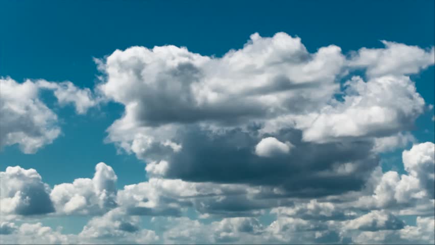 Clouds on blue sky at midday
