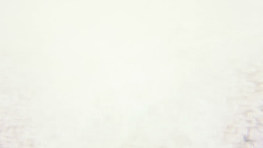Macro clip of liquid, bubbles and froth. Abstract video that could be used as effect, transition or background and even as a conceptual video. 