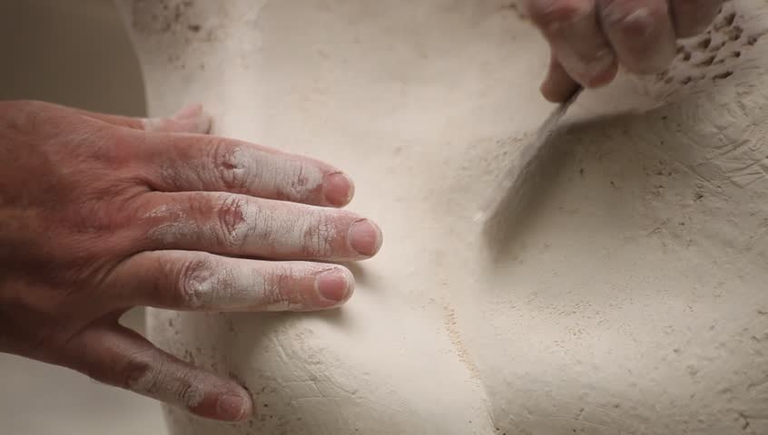 Sculpting class workshop. Stone carving sculpture.

