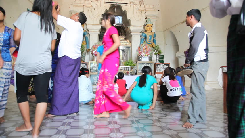 BAGAN, MYANMAR - APRIL 18: Tourists visit the Pagoda on April 18, 2012 in Bagan, Myanmar. Bagan is the most popular place to visit in Myanmar.